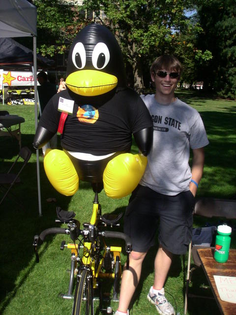 Tux on a bike