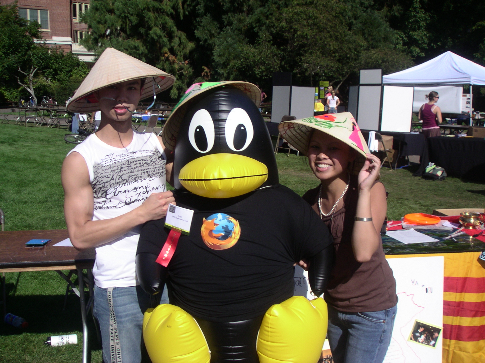 Tux and a rice hat